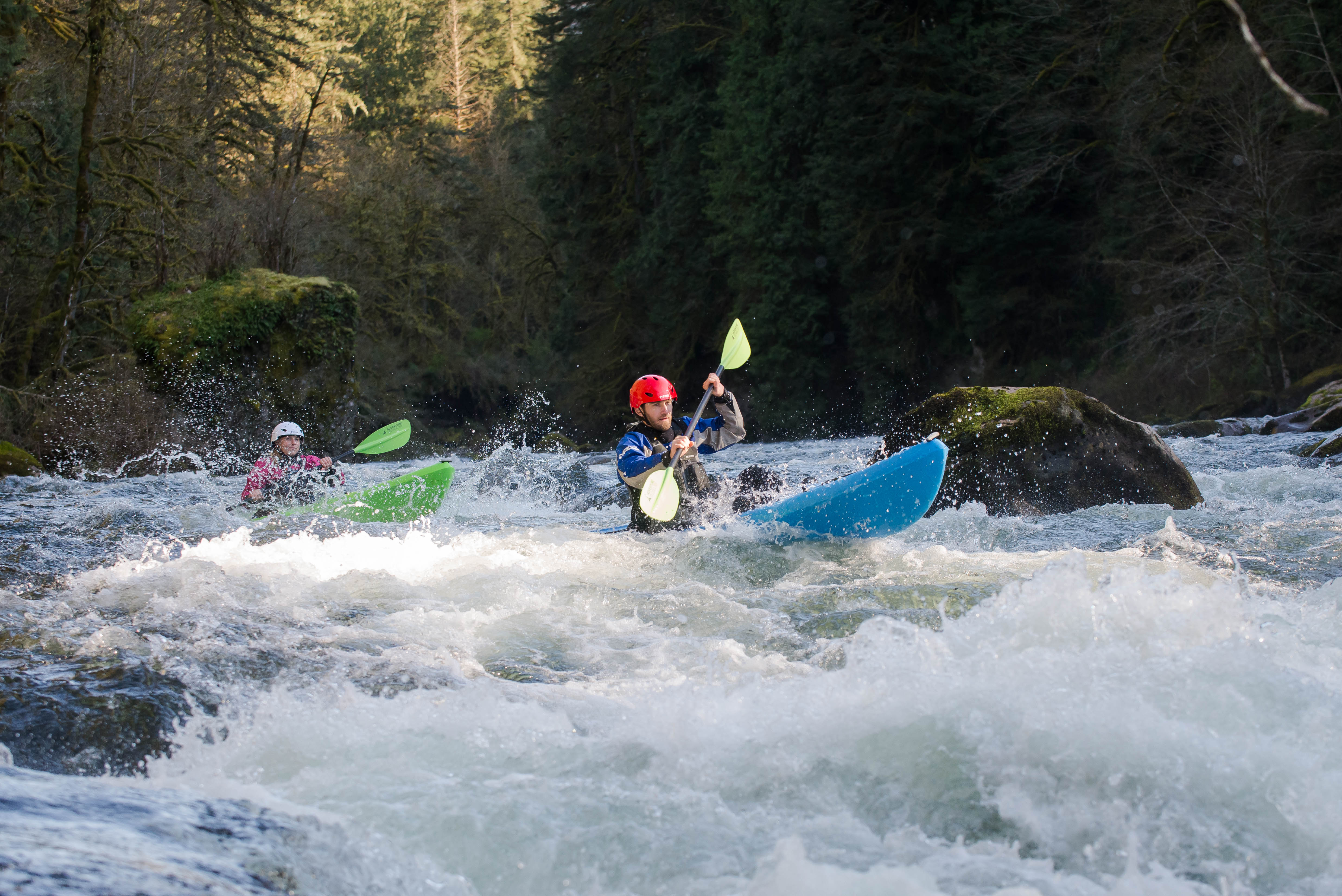 Two whitewater kayakers on the Cartecay River 