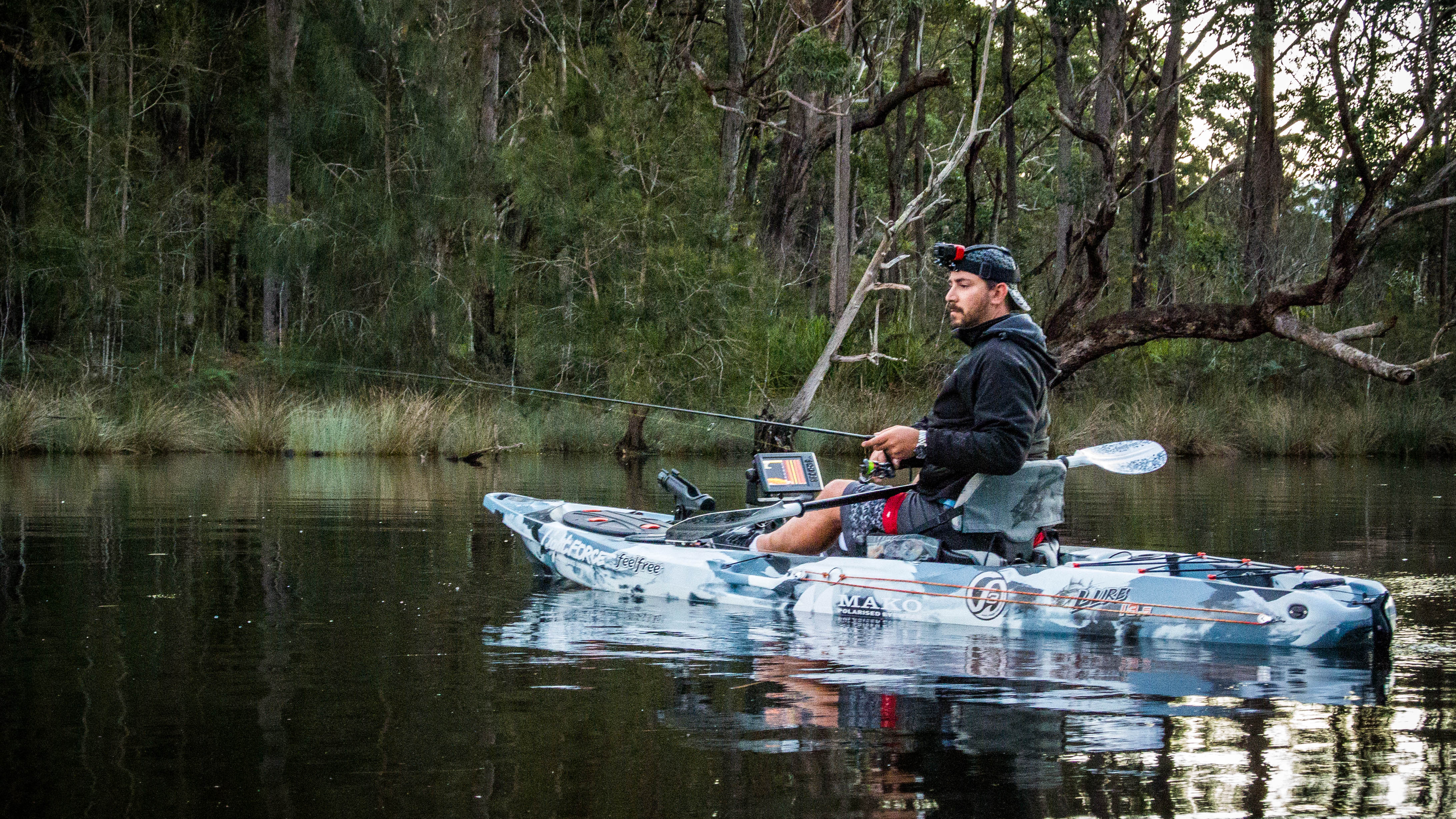 man fishing out of Feelfree Lure 11.5 v2 kayak