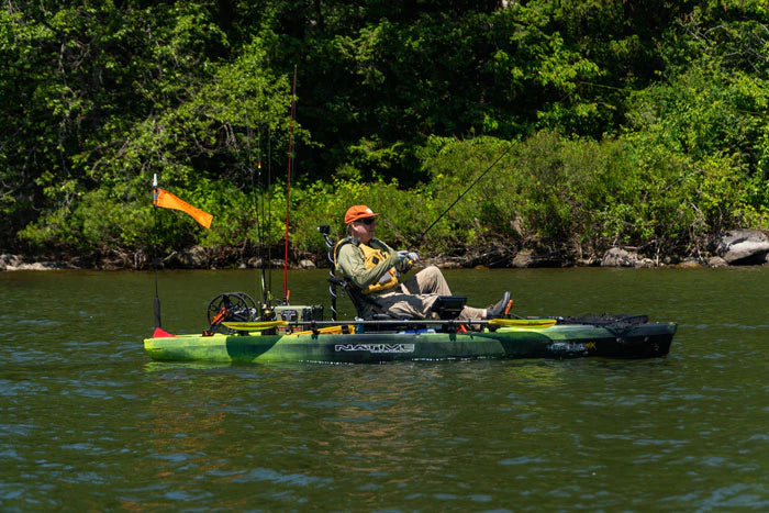 Man fishing in Native Slayer 12.5 Max kayak 