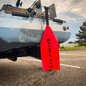 K,orD. Long Load Flag, Flag, Kayak, or Die™, Black Text at Festive Water Paddlesports