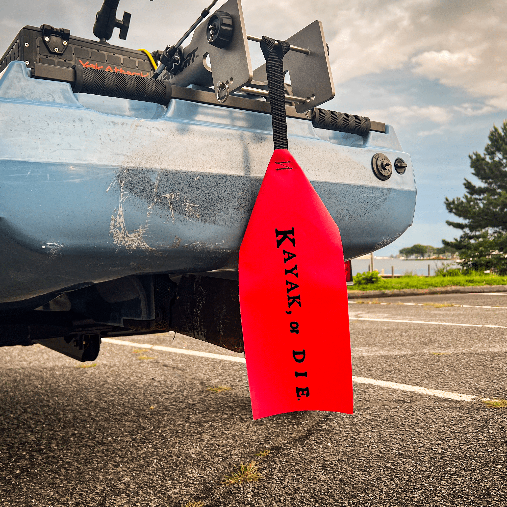 K,orD. Long Load Flag, Flag, Kayak, or Die™, Black Text at Festive Water Paddlesports